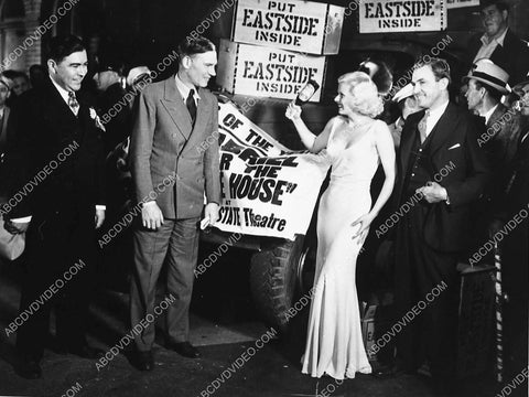 Jean Harlow smashing bottle of champagne for movie promo I think 4721-26
