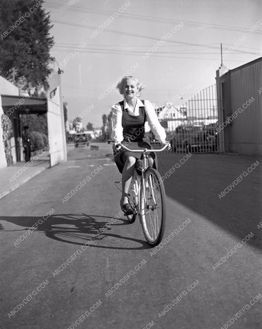 publicity Barbara Moffett riding her bicycle at RKO Studios 4b10-216