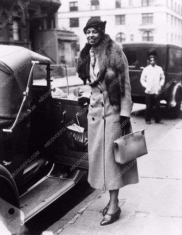 First Lady Eleanor Roosevelt getting ride in convertable 4b10-273