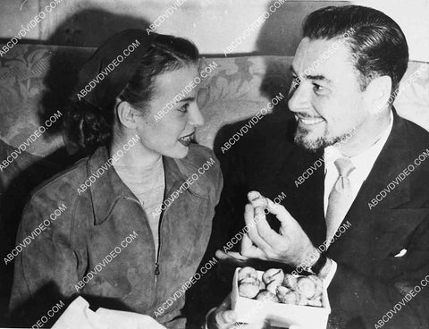 candid Errol Flynn, Princess Irene Ghica eating escargot snails (yuck) 5596-021