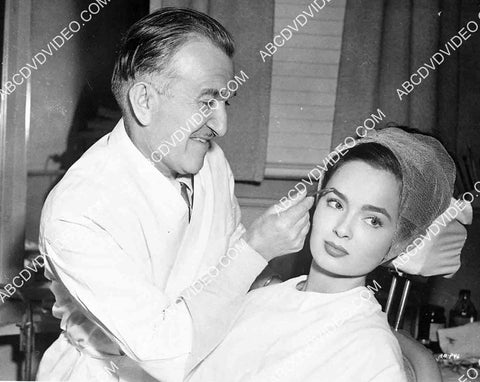 Ann Blyth sitting in Jack Pierce's makeup chair getting the works 5623a-12
