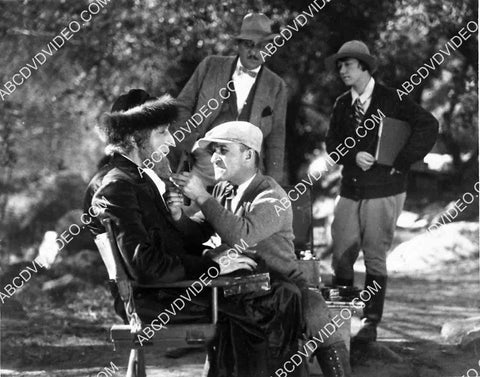 Jack Pierce does finishing makeup for Nigel de Brulier unknown film 5623a-16