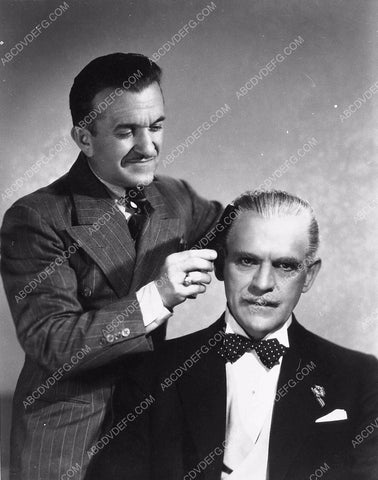Jack Pierce combs hair for Boris Karloff 5623b-09