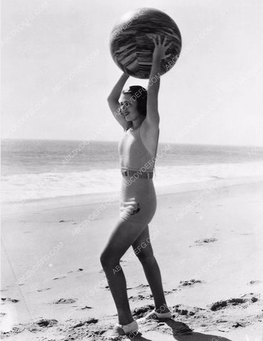 Ruby Keeler in her new swimsuit playing beach ball 5956-29
