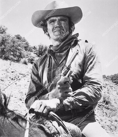 David Canary on his horse w six shooter 6103-13