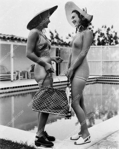 Priscilla Lane and friend try out their new swimsuits 6244-30