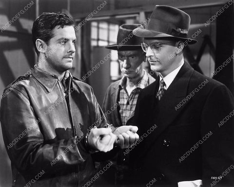 Robert Cummings in handcuffs film Saboteur 6273-11