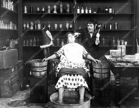 a man shaving a woman unknown silent comedy film scene 6522-15