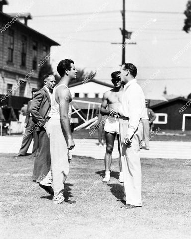 Robert Taylor and the crew playing baseball between the takes 6629-12