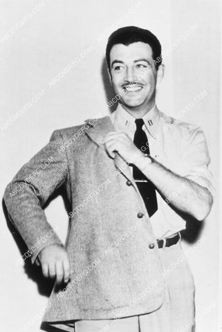 Robert Taylor trying on a jacket 6640-11