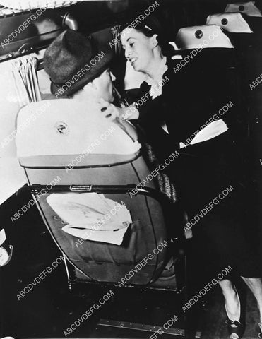 Robert Taylor getting seated on an airplane 6640-15
