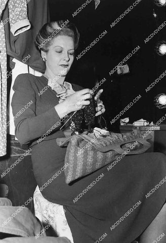 candid Gale Sondergaard knitting on set 7019-004