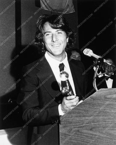 Dustin Hoffman receiving an award 8109-19