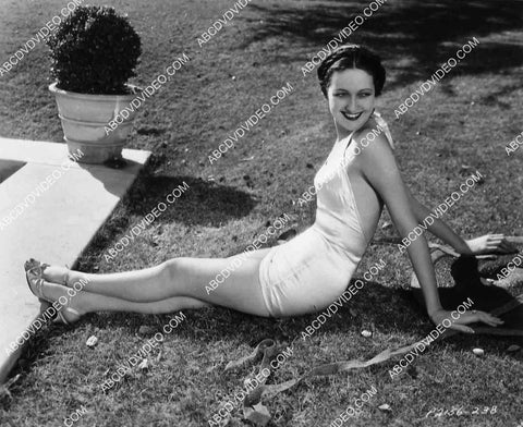 Dorothy Lamour enjoys the sunshine in her new swimsuit 8242-3