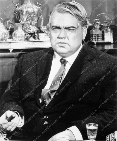 Orson Welles seated with cigar 8271-18