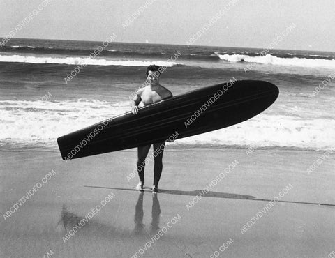 handsome Tom Neal spends a day at the beach and goes surfing 8628-19