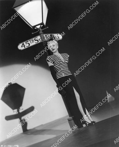 Marjorie Reynolds under the lamp post film Meet Me on Broadway 8B11-295