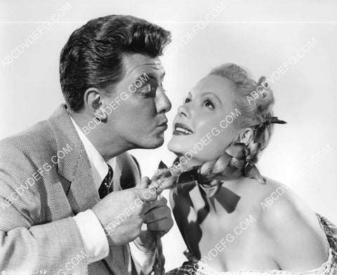 Fred Brady pulls on Marjorie Reynolds' pigtails film Meet Me on Broadway 8B11-392