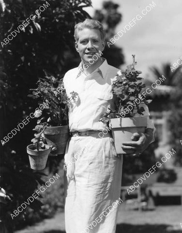 Nelson Eddy doing some gardening 8B11-762