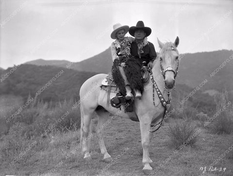 Buck Jones and cute cowgirl unknown film 8b03-359