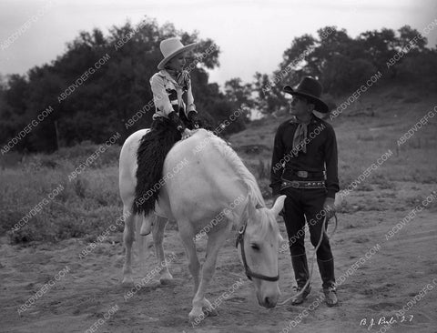 Buck Jones and cute cowgirl unknown film 8b03-360