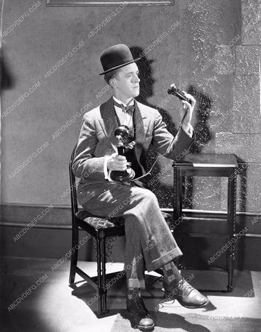 Stan Laurel wants to know what a telephone is 8b03-479