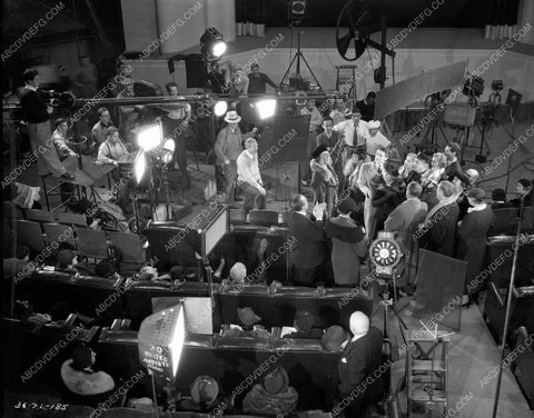 Rowland V. Lee directs cast and crew film One Rainy Afternoon 8b4-324