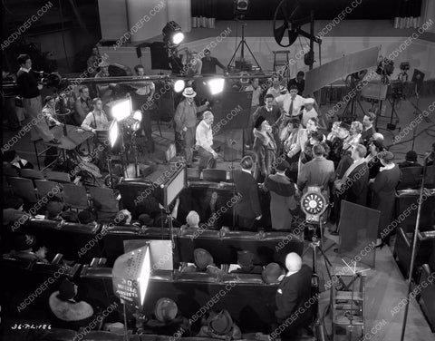 Rowland V. Lee directs cast and crew film One Rainy Afternoon 8b4-325