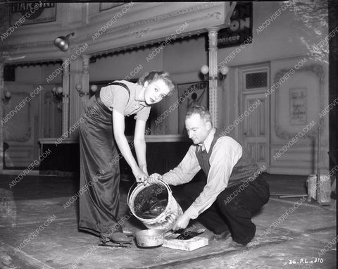 Ida Lupino helps crew member get set ready One Rainy Afternoon 8b4-396