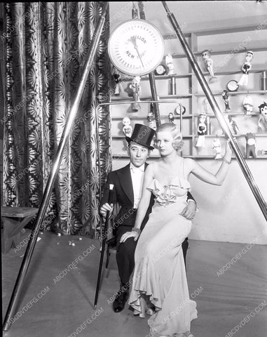 George Raft Joan Bennett get weighed behind the scenes 8b4-549