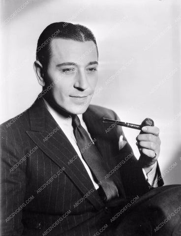 George Raft enjoying a pipe portrait 8b4-550