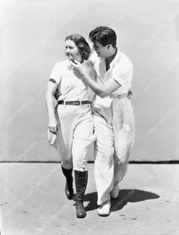 candid Barbara Stanwyck and Robert Taylor 8b5-109