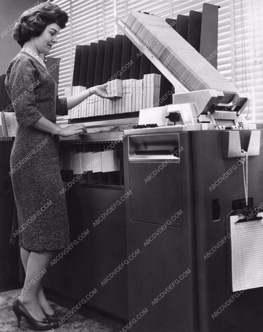 secretary uses new IMB data processor for customer service 8b6-076
