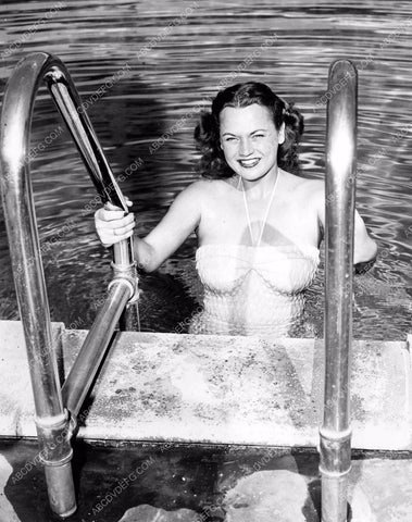swimwear model exits the pool on warm summer day in southern Cal 8b6-113