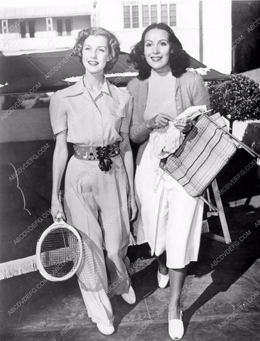 Dolores Del Rio and friend head out toward the tennis courts candid 8b6-456