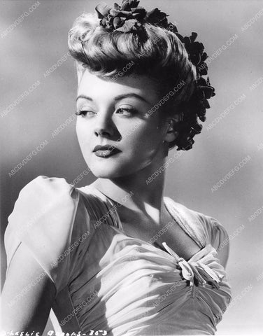 Leslie Brooks in glamorous dress and hair style 8b6-539