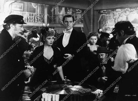 Edith Barrett Ray Middleton at the roulette wheel film Lady for a Night 9264-25
