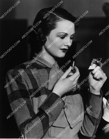 Elizabeth Allen does a quick makeup check 9890-13