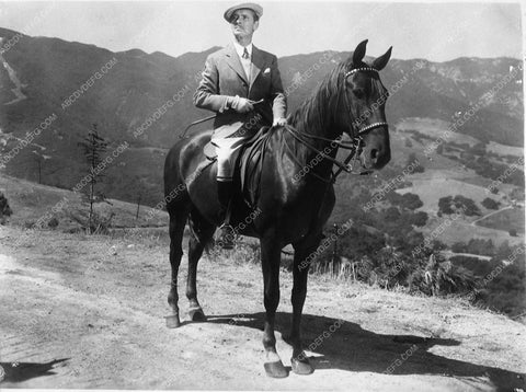 Ronald Coleman on horseback 9909-32