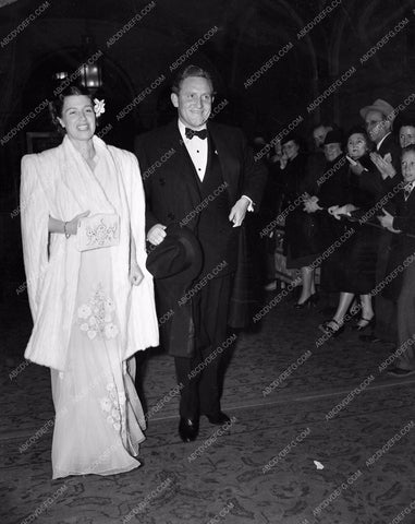 1938 Oscars Spencer Tracy and wife ? Arriving at the ceremonies aa1938-07</br>Los Angeles Newspaper press pit reprints from original 4x5 negatives for Academy Awards.