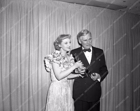 1948 Oscars Celeste Holm John Huston Academy Awards aa1948-09</br>Los Angeles Newspaper press pit reprints from original 4x5 negatives for Academy Awards.
