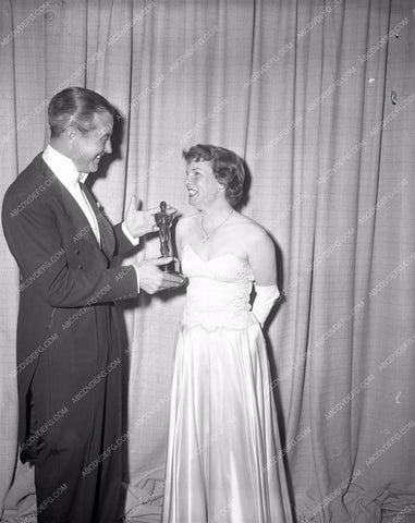 1949 Oscars Ray Milland giving Mercedes McCambridge Award aa1949-23</br>Los Angeles Newspaper press pit reprints from original 4x5 negatives for Academy Awards.