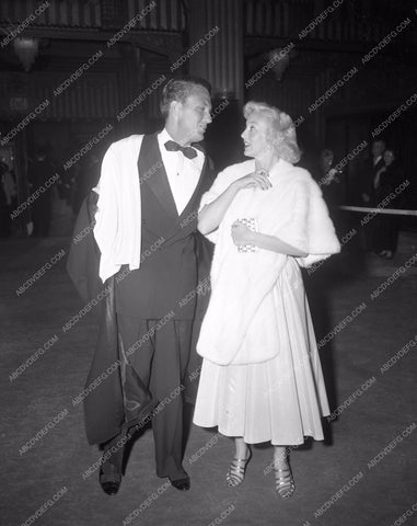 1949 Oscars Robert Stack and date arriving Academy Awards aa1949-95</br>Los Angeles Newspaper press pit reprints from original 4x5 negatives for Academy Awards.