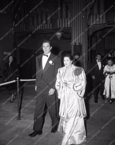 1949 Oscars Rock Hudson Yvonne De Carlo arriving at Academy Awards aa1949-98</br>Los Angeles Newspaper press pit reprints from original 4x5 negatives for Academy Awards.