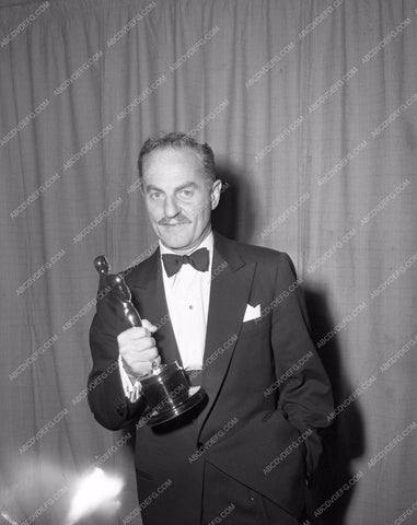 1954 Oscars Darryl F. Zanuck and statue Academy Awards aa1954-14</br>Los Angeles Newspaper press pit reprints from original 4x5 negatives for Academy Awards.