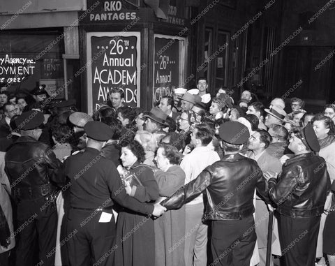 1953 Oscars throngs of fans outside event Academy Awards aa1954-20</br>Los Angeles Newspaper press pit reprints from original 4x5 negatives for Academy Awards.