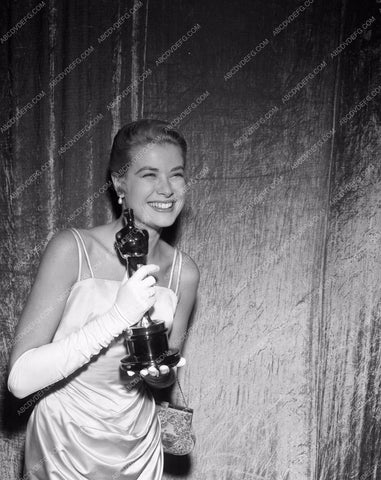 1954 Oscars Grace Kelly and her statue Academy Awards aa1954-46</br>Los Angeles Newspaper press pit reprints from original 4x5 negatives for Academy Awards.