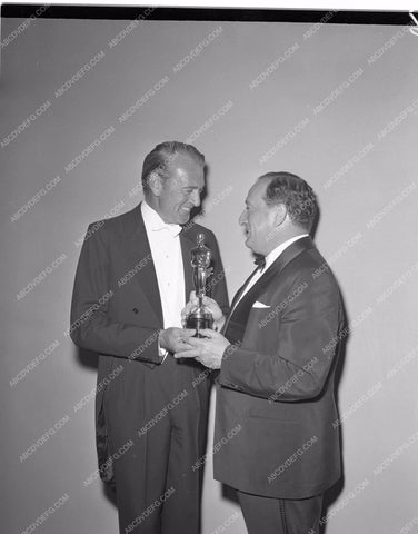 1956 Oscars Gary Cooper and his statue Academy Awards aa1956-32</br>Los Angeles Newspaper press pit reprints from original 4x5 negatives for Academy Awards.