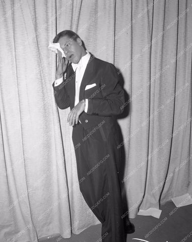 1957 Oscars Jerry Lewis catches his breath Academy Awards aa1956-59</br>Los Angeles Newspaper press pit reprints from original 4x5 negatives for Academy Awards.