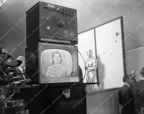 1958 Oscars Ingrid Bergman on TV backstage Press pit Academy Awards aa1958-10</br>Los Angeles Newspaper press pit reprints from original 4x5 negatives for Academy Awards.
